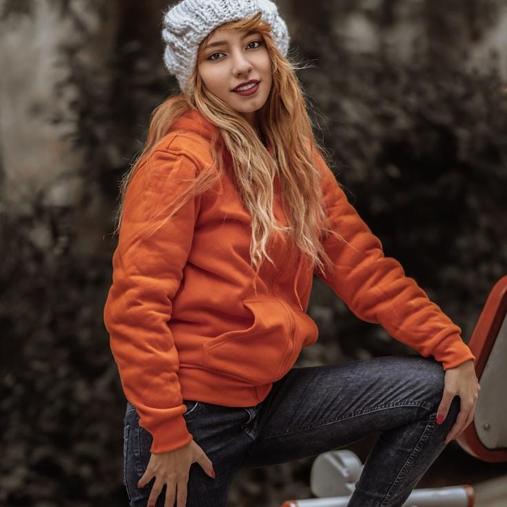 Amara Reed, Lead Design Curator at MapleAtlasEcho, reviewing corporate floral arrangements